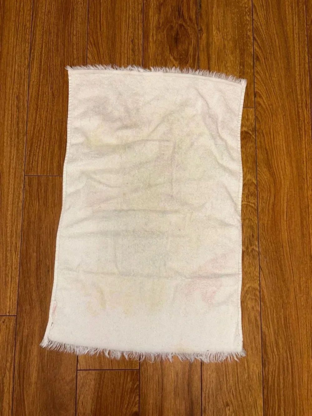 Vintage 1970s hand towel with a floral design and butterflies